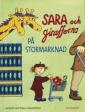 Sara och girafferna på stormarknad